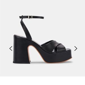 Chunky black heels.
Leather
4" Heel Height
1.5" Platform Height